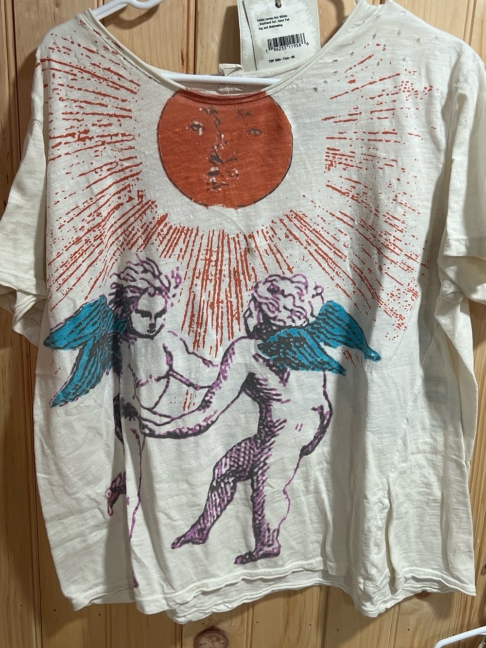 Magnolia Pearl White Tee with Orange Sun and Teal Angel Wings